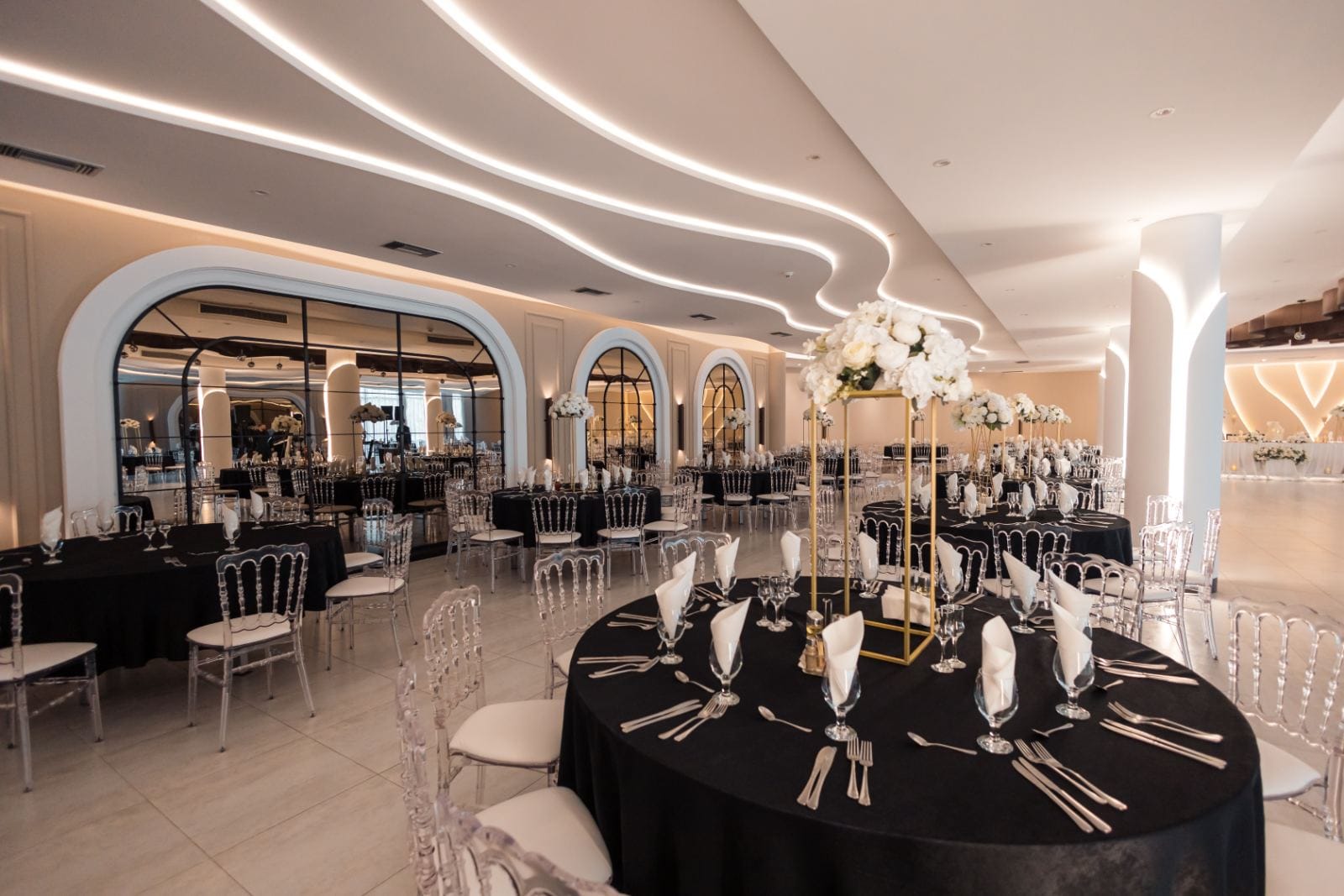 A celebration hall arranged for an elegant event